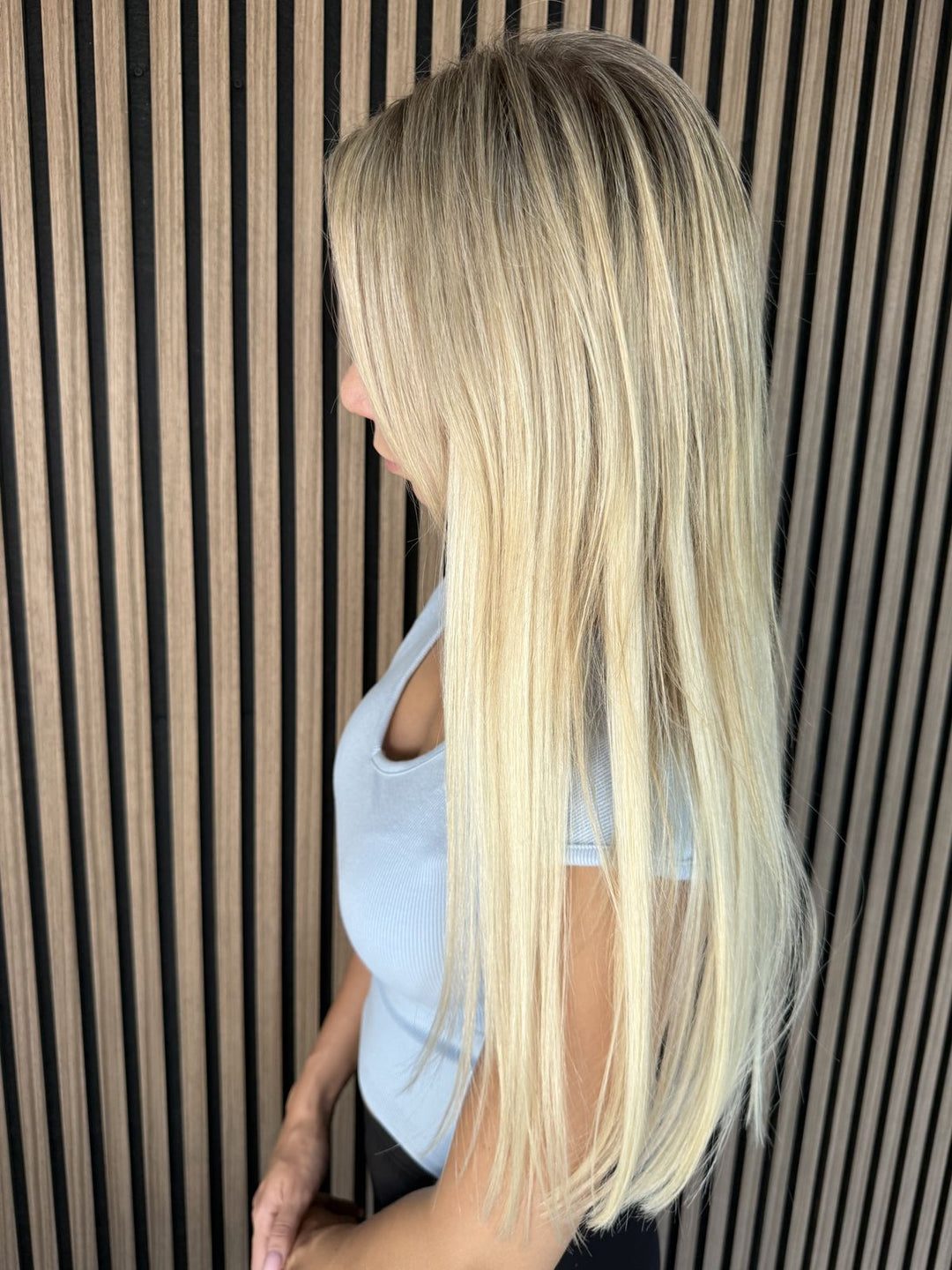 Long blonde hair with tape-in extensions – the result after application