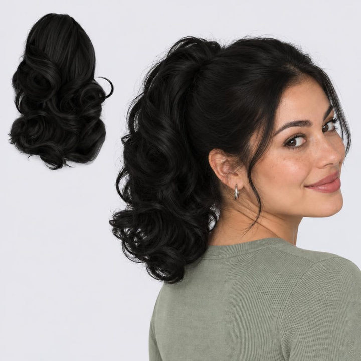 Tangled Ponyo in Black – curly clip-in ponytail extension, shown loose and worn by a model