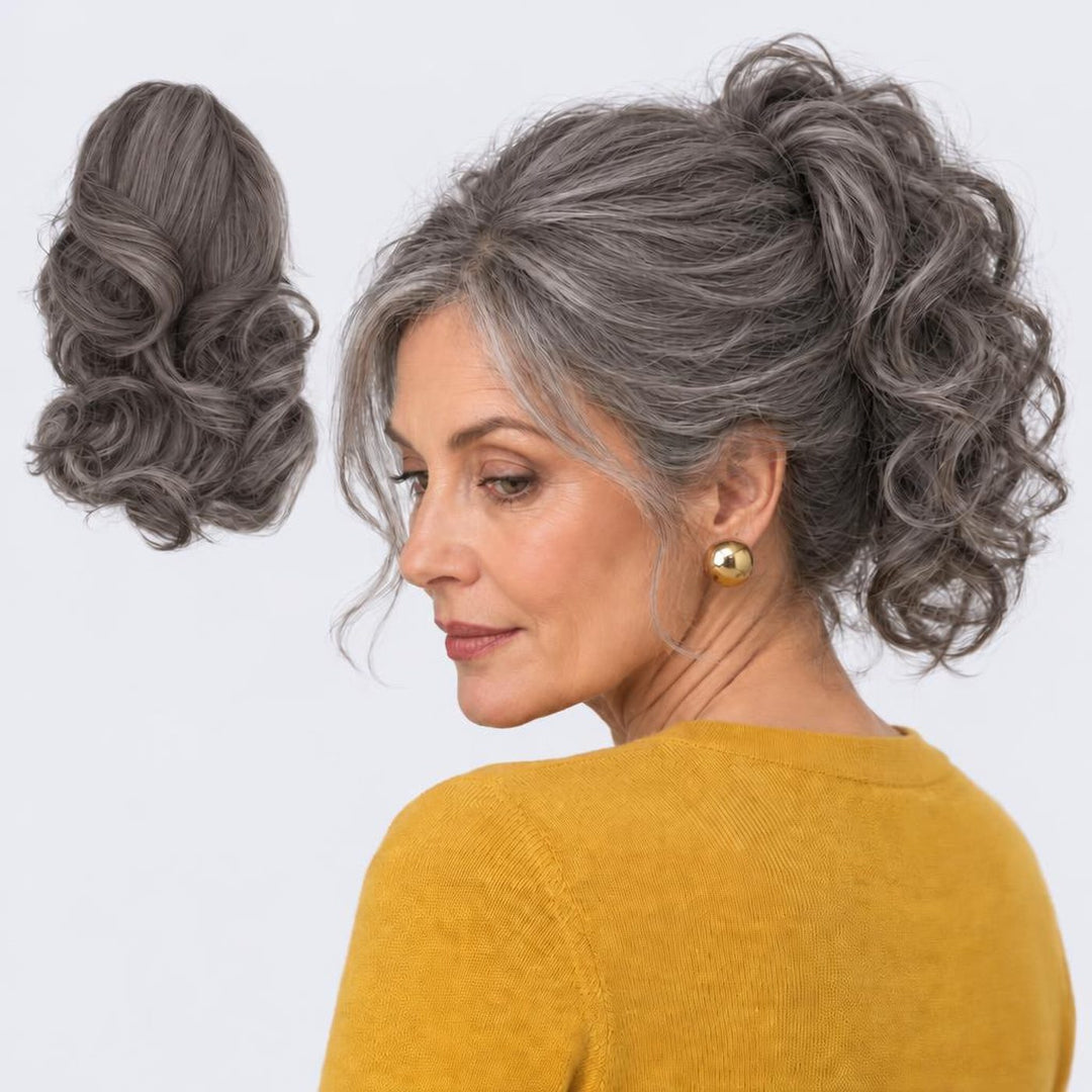 Tangled Ponyo in Dark Grey – curly clip-in ponytail extension, shown loose and worn by a model