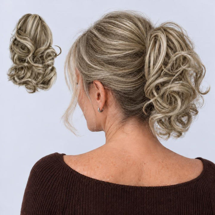 Tangled Ponyo in Grey Blonde – curly clip-in ponytail extension, shown loose and worn by a model