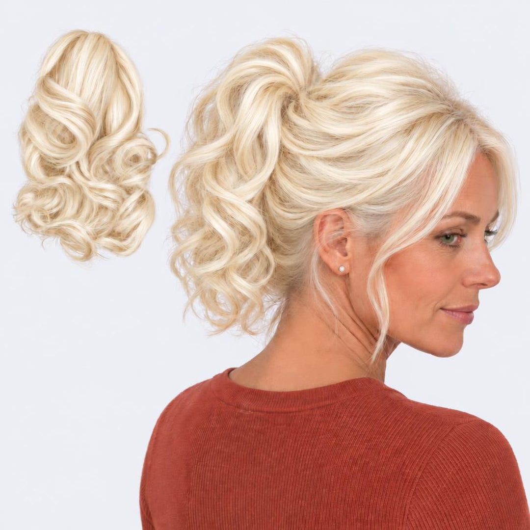 Tangled Ponyo in Summer Blonde – curly clip-in ponytail extension, shown loose and worn by a model